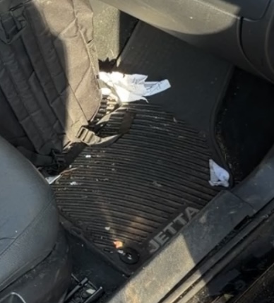 Jetta floor mat before an interior detail