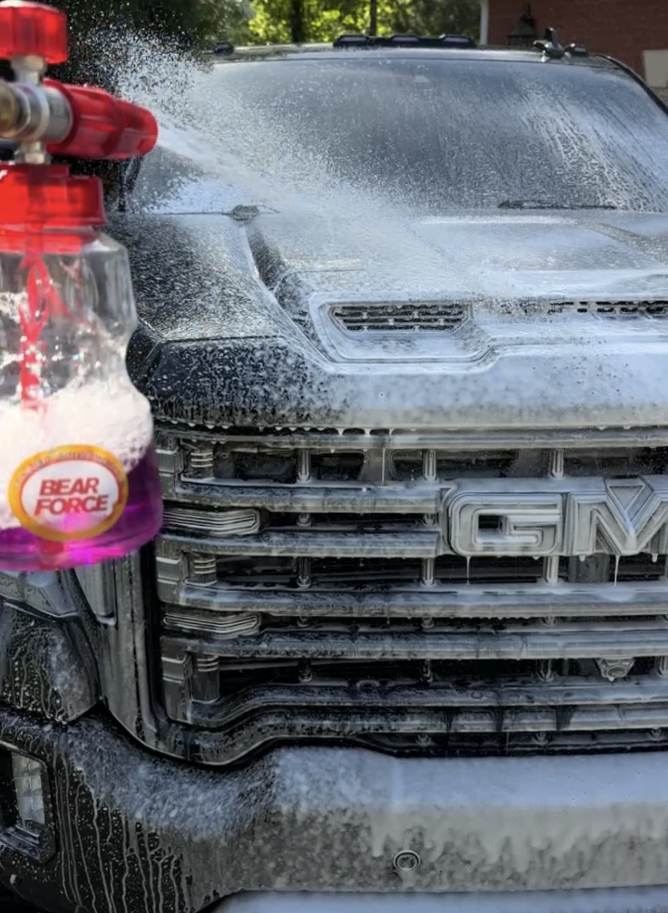 Foam wash on a GMC truck during a mobile detail